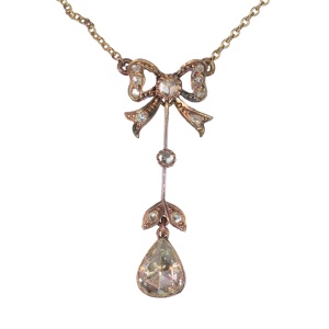 Era of Elegance: 1890s Victorian Bow and Pear Diamond Pendant